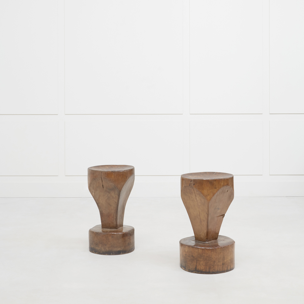 Pair of sculptural side tables
