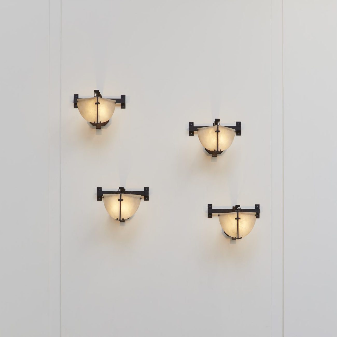Pair of LP180 wall lights entitled “Masque“
