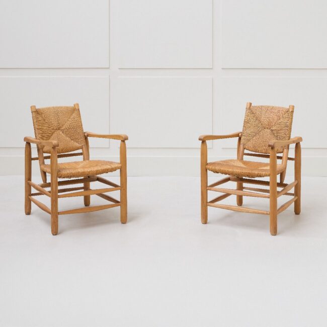 Charlotte Perriand, “N°21” known as “Chamrousse” pair of armchairs