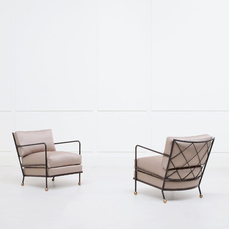 Jean Royère, Pair of “Croisillons ” armchairs – from a set of four